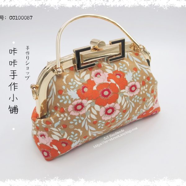 手提斜挎两用口金包